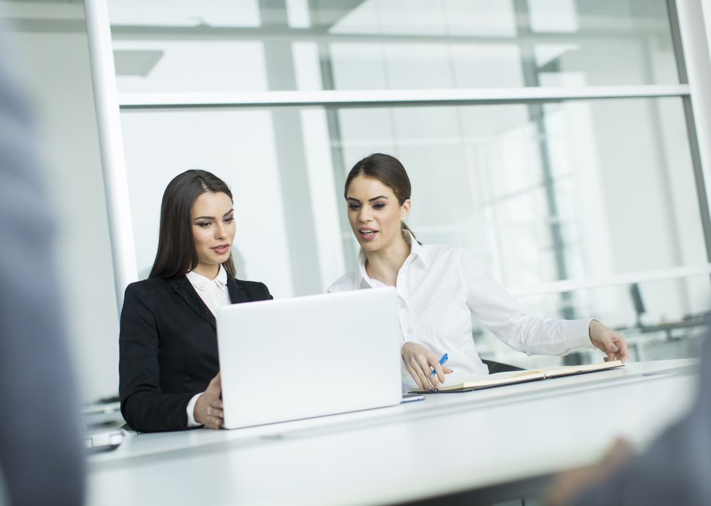 Two women collaborating on a project