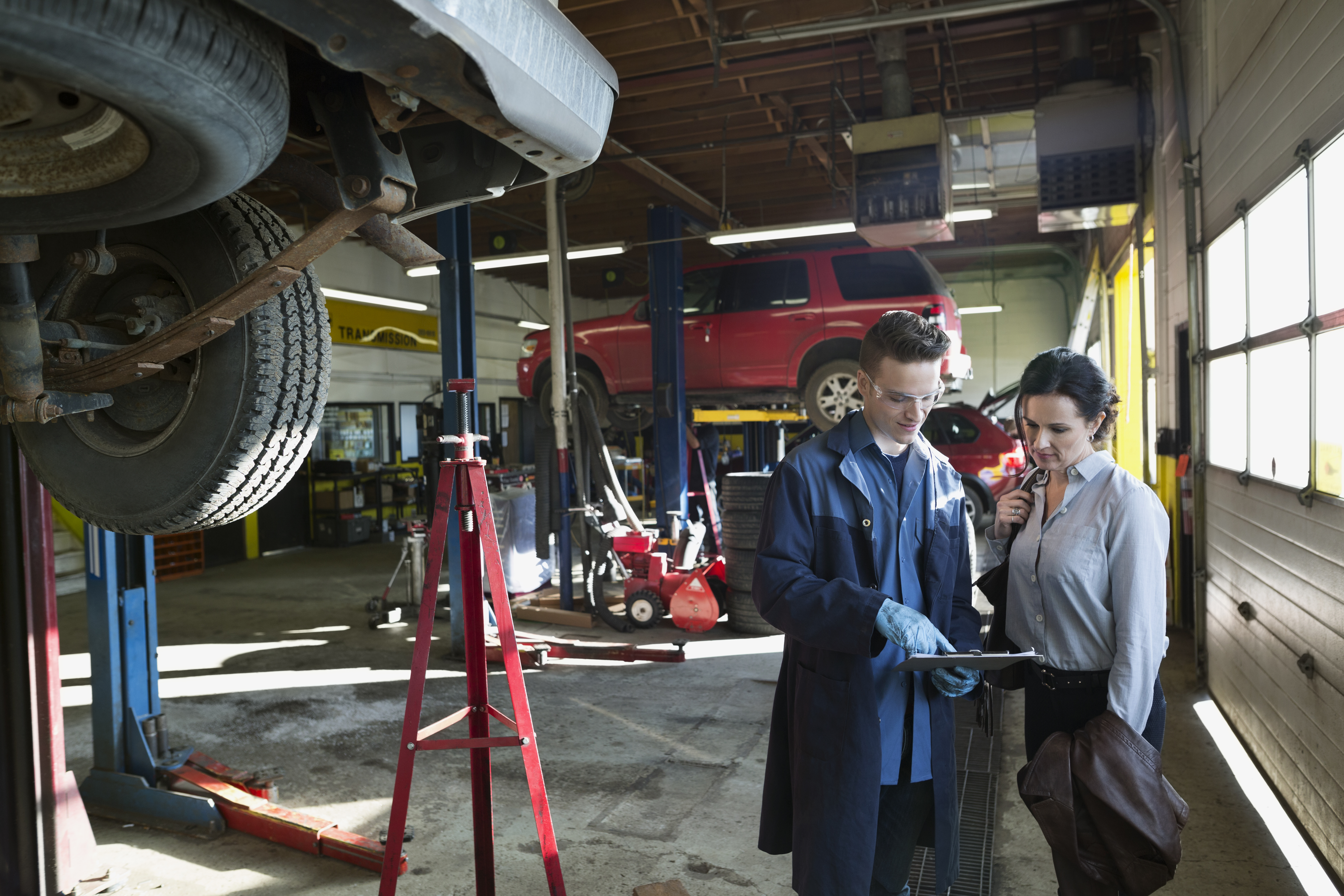 Two mechanics in their shop