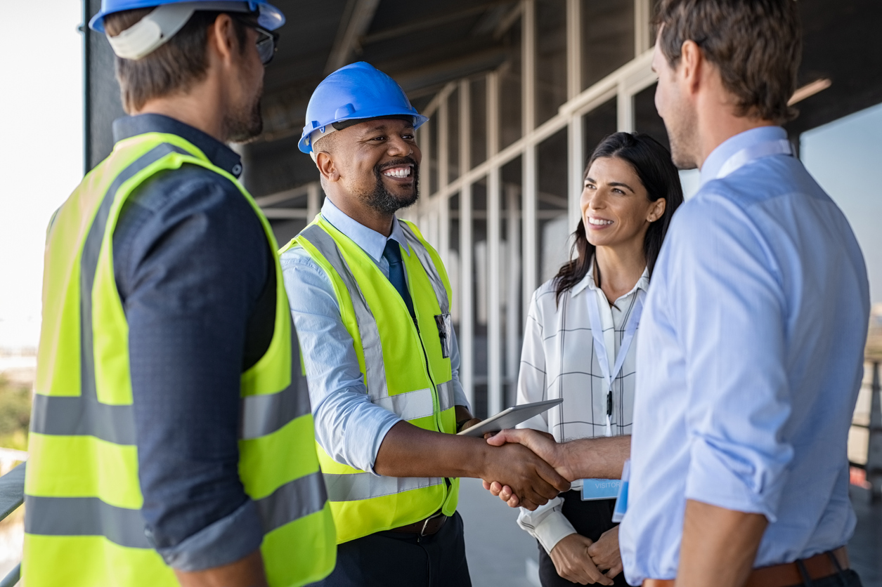 Engineer and Business Man handshake