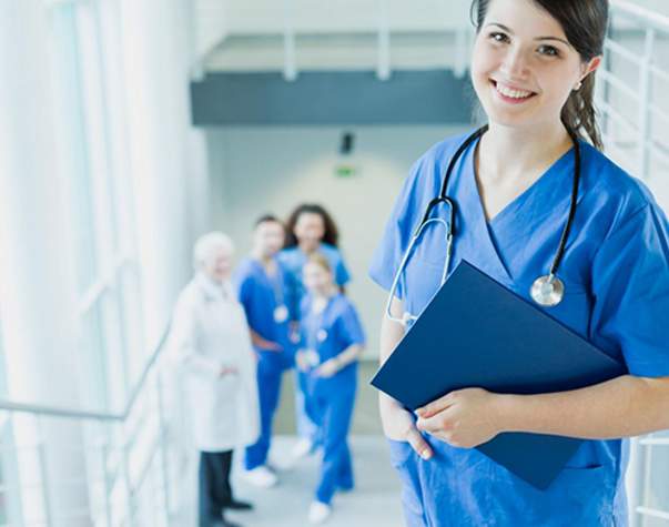 a nurse holds a clipboard with patient records